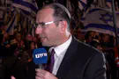 MK Rothman snatches megaphone from leftist protesters