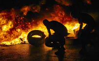 Arabs burn tires during weekend riots, causing severe pollution