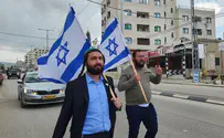 MK Sukkot marches through Huwara with Israeli flag