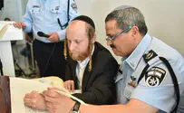 Police chief dedicates Torah scroll to fallen officers