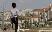 Watch: Cop hurls bucket at haredi boy during clashes in Beitar