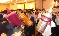 To kiss the Torah, to dance with it, to be one with it