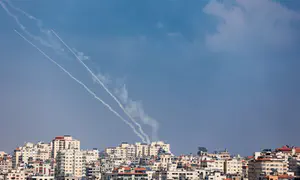 Rocket hits vehicle in Gaza border town
