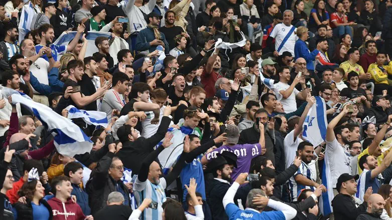 Jewish fans cheer on Israel's under-20 soccer team at the Diego Maradona Stadium