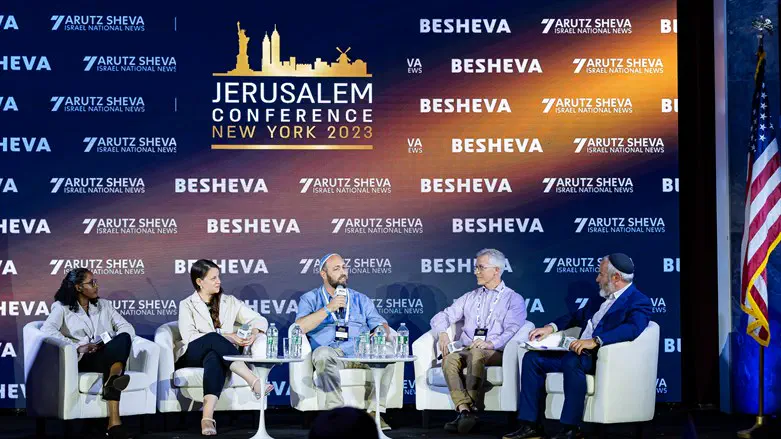 Yishai Fleisher leads a panel discussion on aliyah in New York City