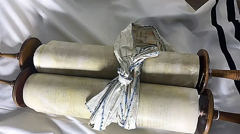 A Torah scroll that the Nazis stole from a Czech congregation on display at The