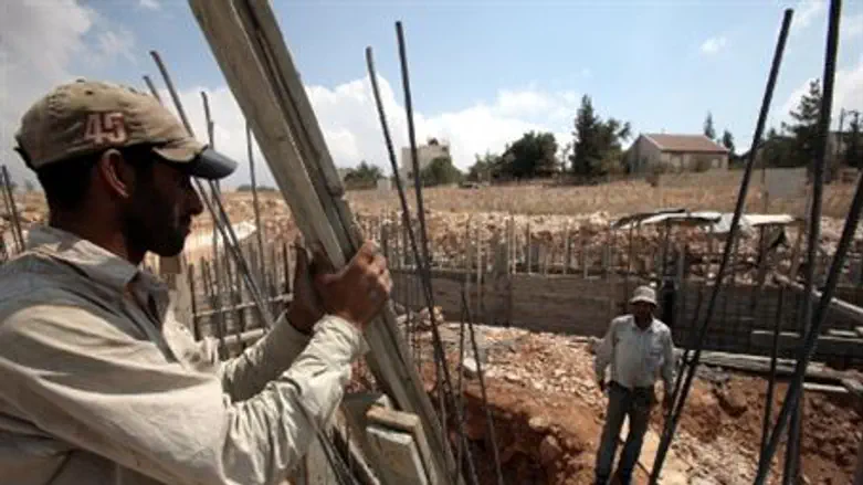 Building with Jews  in eastern Gush Etzion  
