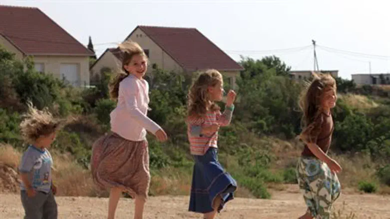 Children play in the Hayovel neighborhood of 