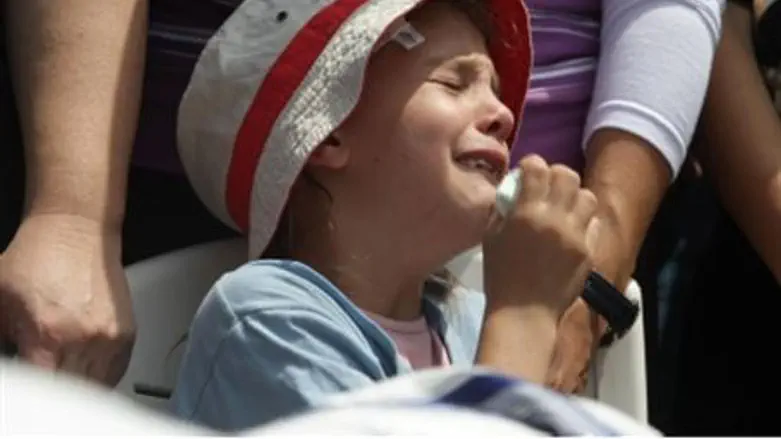 Child weeps at funeral of Arab terror victims
