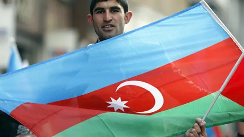 Man holds Azerbaijani flag