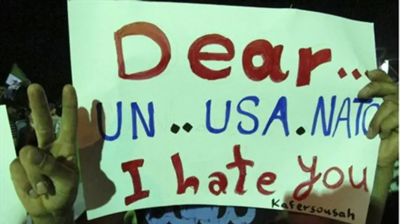 Sign at Syrian protest against Assad