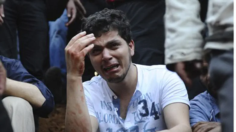 Syrian man mourns near Damascus
