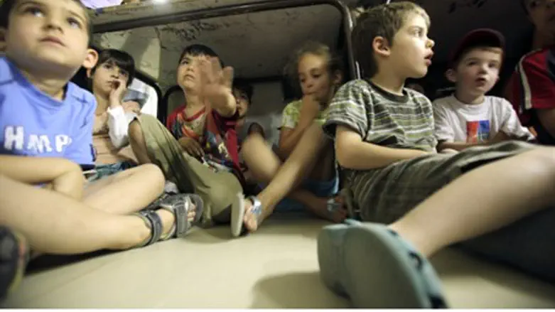 Children in bomb shelter (illustrative)