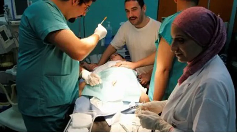 A Muslim boy is circumcised at a hospital in 