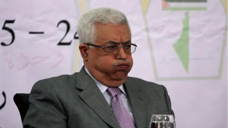 Abbas with map of 'Palestine'Palestine' in ba