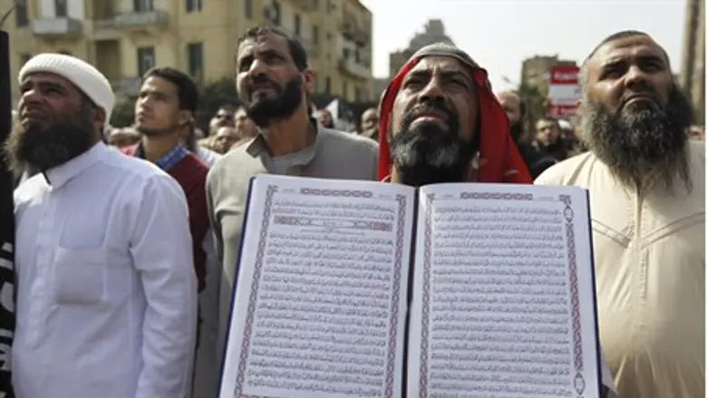 Egyptian Salafist holds copy of Koran 