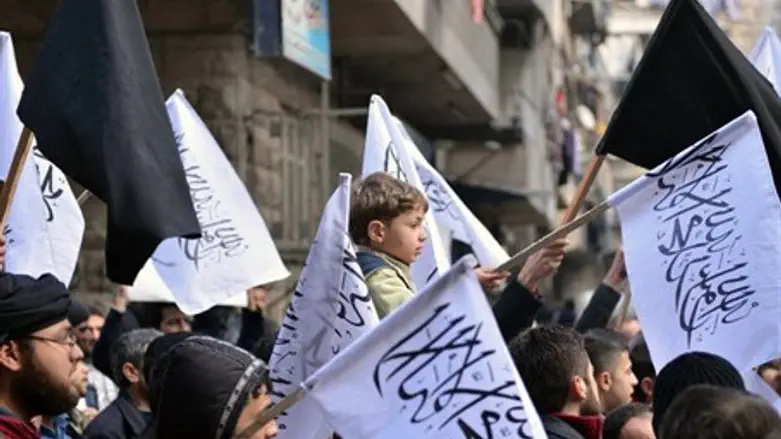 Syrian supporters of Al-Nusra march in Aleppo