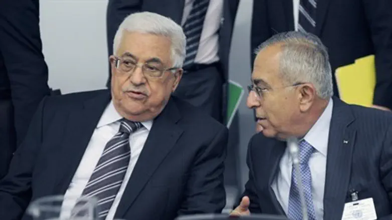 Abbas and outgoing PM Salam Fayyad