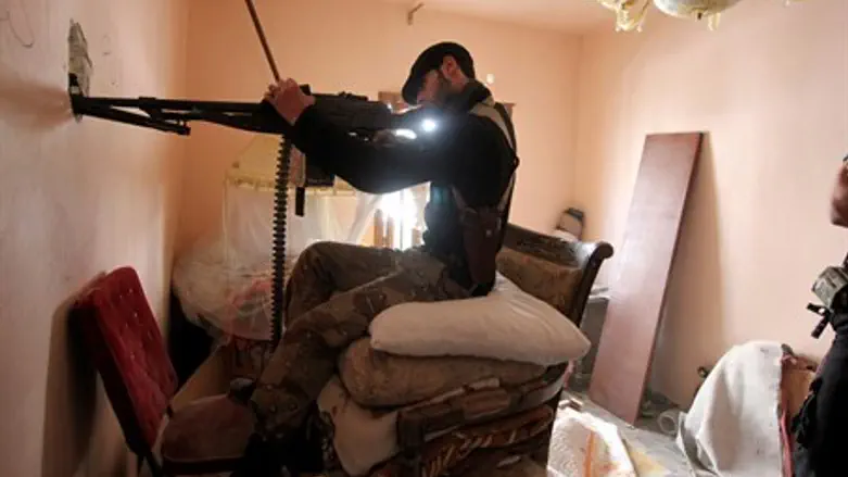 Free Syrian Army fighter, Aleppo, March 2013