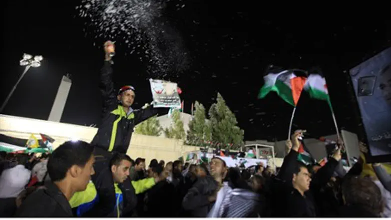 PA Arabs celebrate terrorist release in Ramal