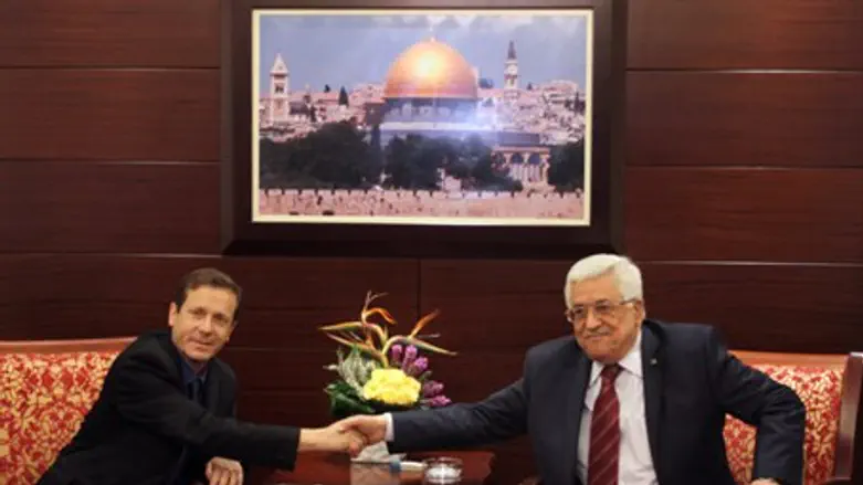 Labor head Yitzhak Herzog meets Mahmoud Abbas
