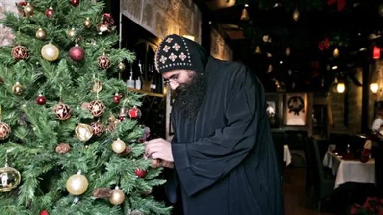 Monk with Christmas tree