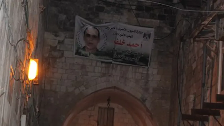 Poster with picture of Ahmed Khalaf.