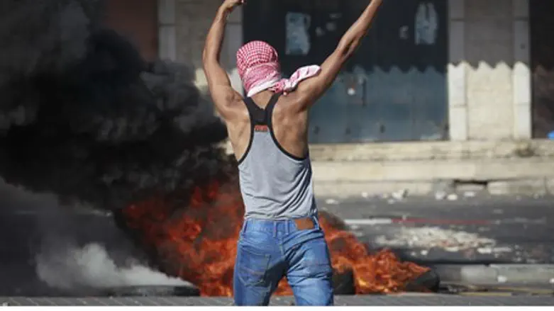 Arab rioter in Jerusalem's 'silent intifada'
