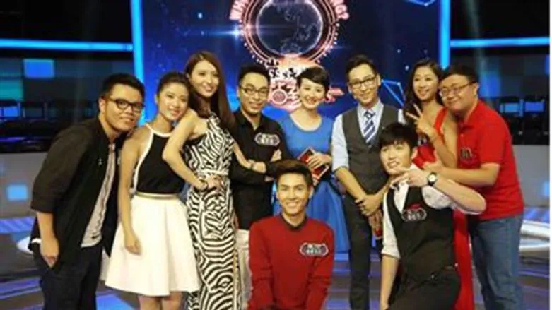 Contestants on China's TV show "Who's Still S
