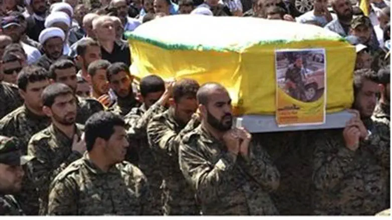Feeling the heat: Hezbollah funeral for fighter killed in Syria (file)