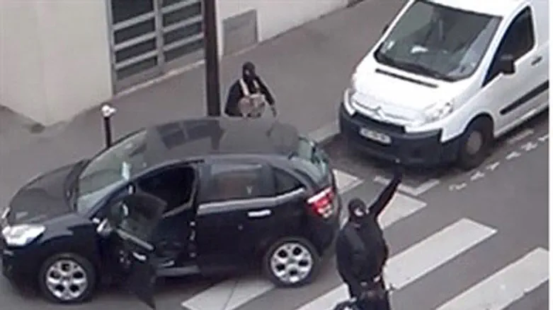 Not a 'terrorist'? Charlie Hebdo killers pose for the camera after the slaughter