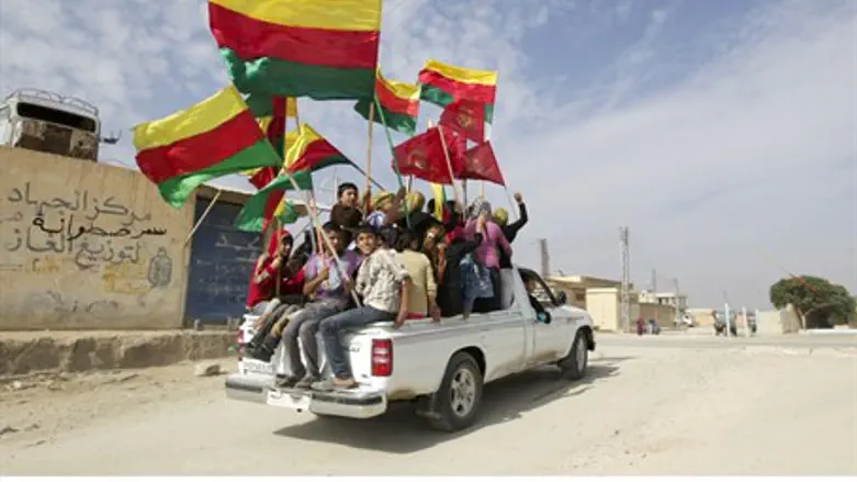 )Kurds in Hasakah province in northeastern Syria (Rojava)