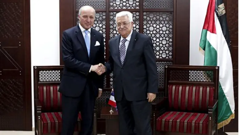 French Foreign Minister Laurent Fabius and PA chairman Mahmoud Abbas