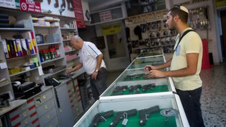 Israelis buy guns in Jerusalem, Oct. 11, 2015