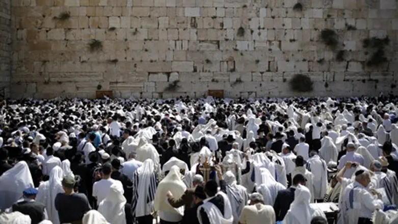 Jews worship at the Kotel (Western Wall)