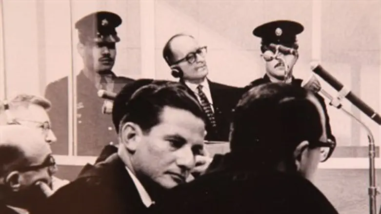 Eichmann trial; Adolf Eichmann in background