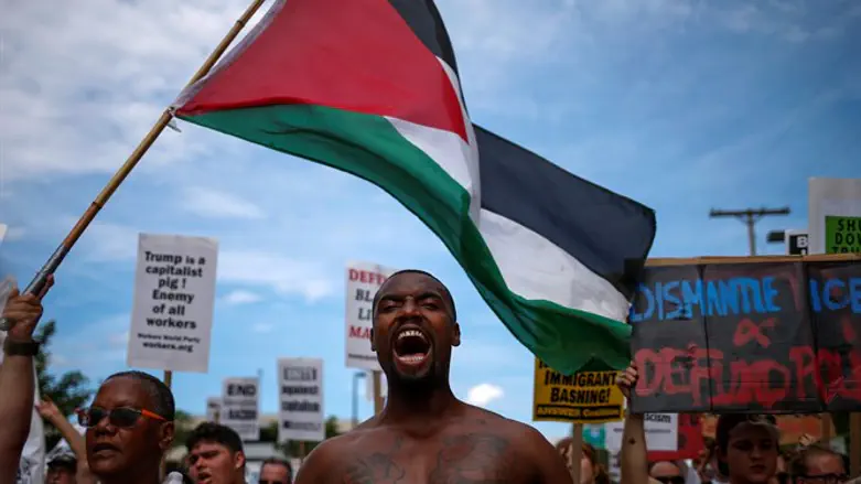 Black Lives Matter protest with Palestinian flag