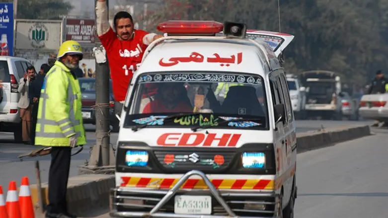 Pakistani ambulance en route to site of massacre