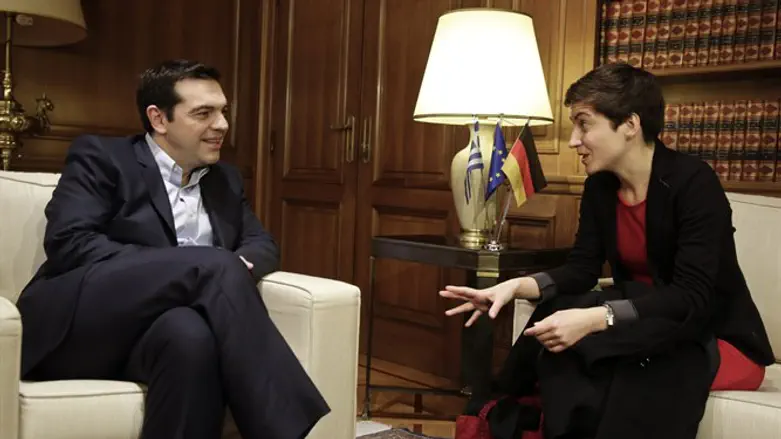 Greek Prime Minister Alexis Tsipras (L) meets with member of EU for The Greens Ska Keller 