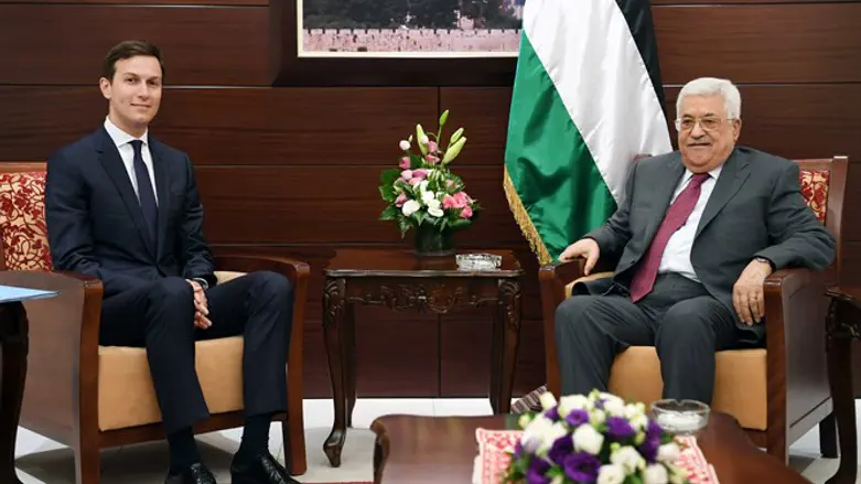 Kushner (L) and Abbas smiling for cameras