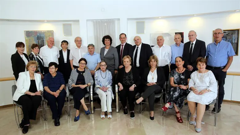 Ginsburg (center) received at Israeli Supreme Court