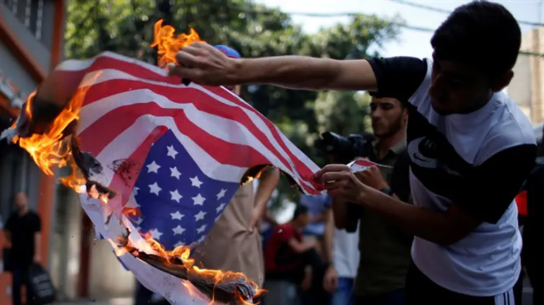 Muslim boy burns US flag in Gaza City