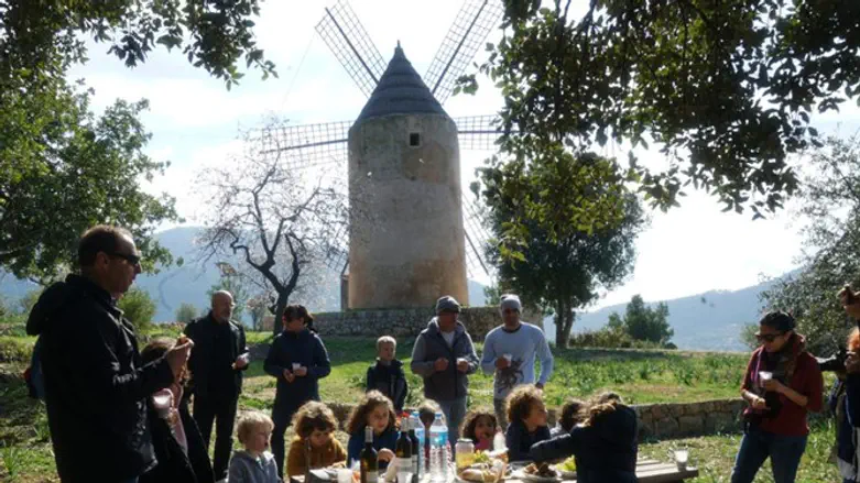 Members of the Jewish community of Mallorca, Spain, attend a Tu b’Shvat picnic,