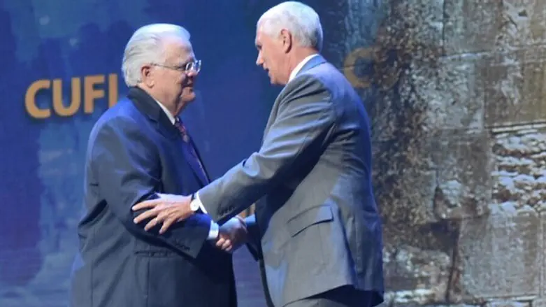 Pastor John Hagee shaking hands with Vice President Mike Pence