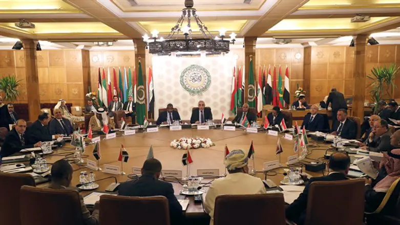Permanent representatives of the Arab League take part in an emergency meeting in Cairo