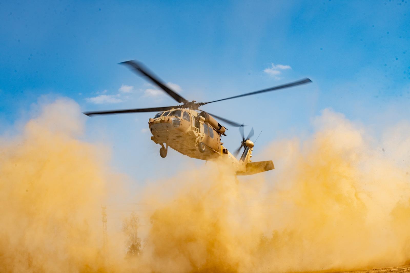 Copter on way to receive returned hostages