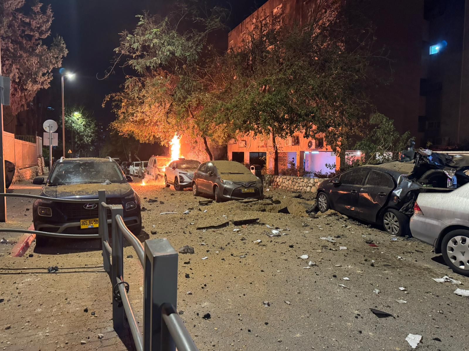 Fire at impact site in Holon