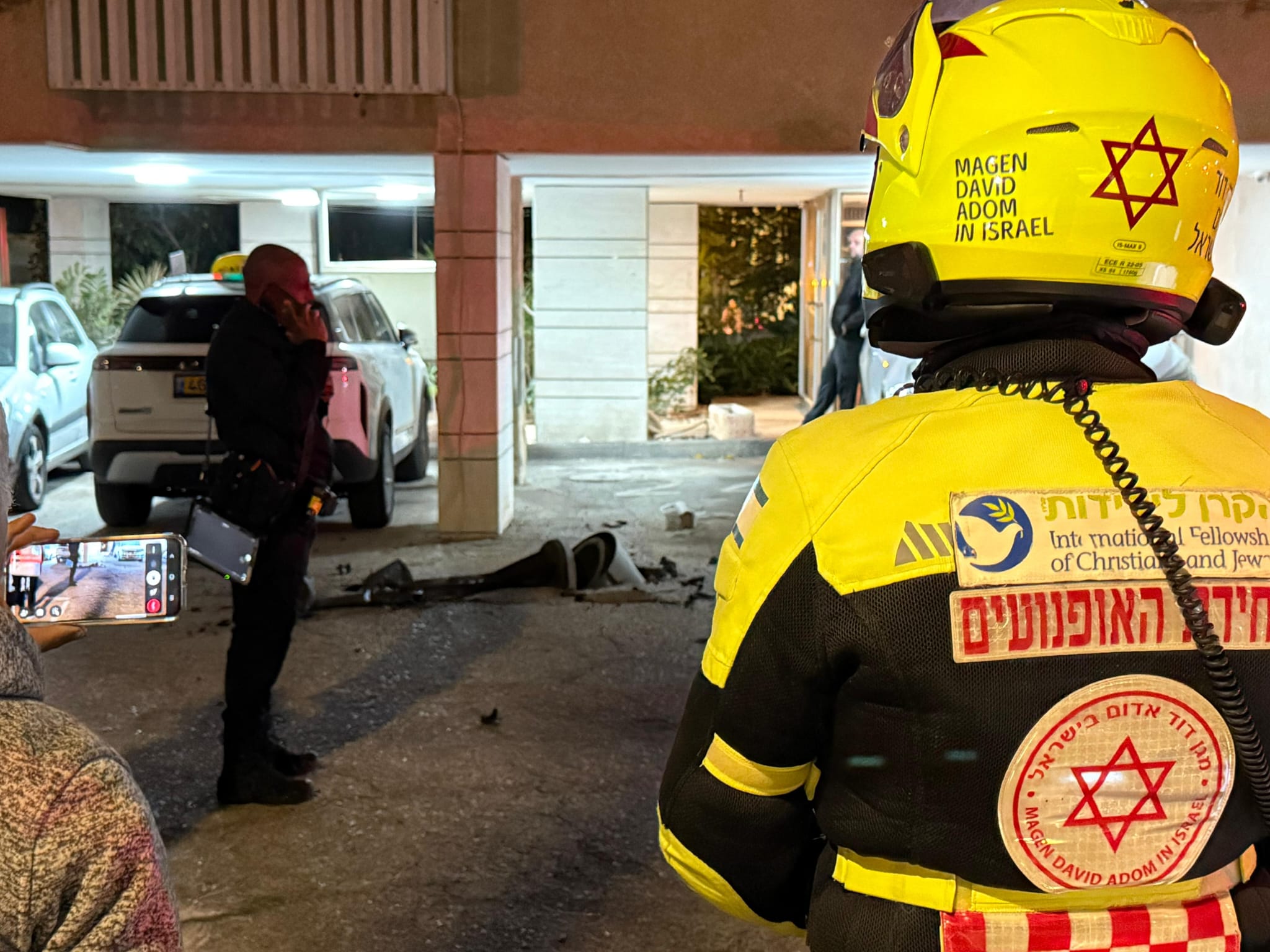 Magen David Adom teams at missile impact site