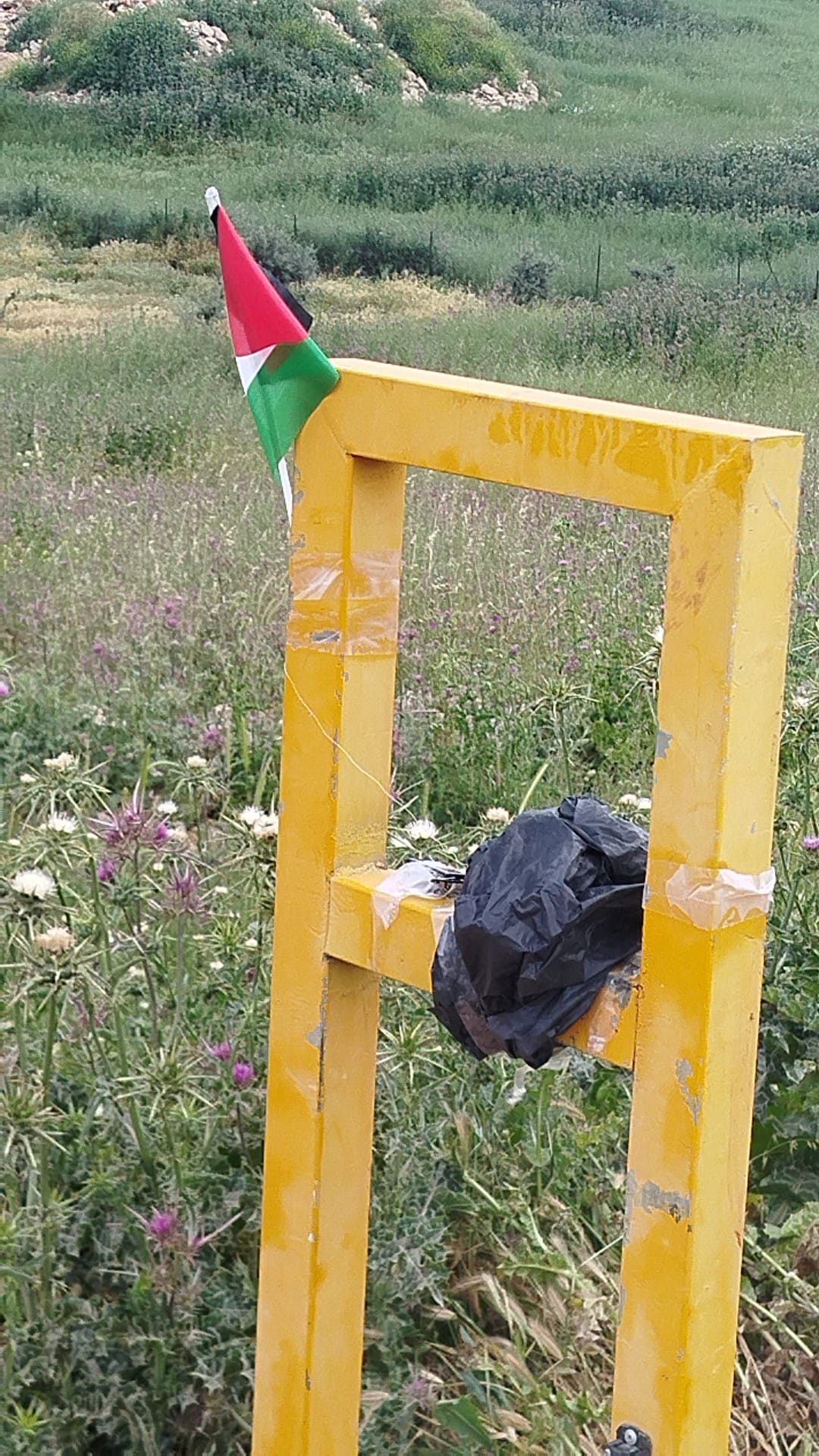 The explosive device next to the flag