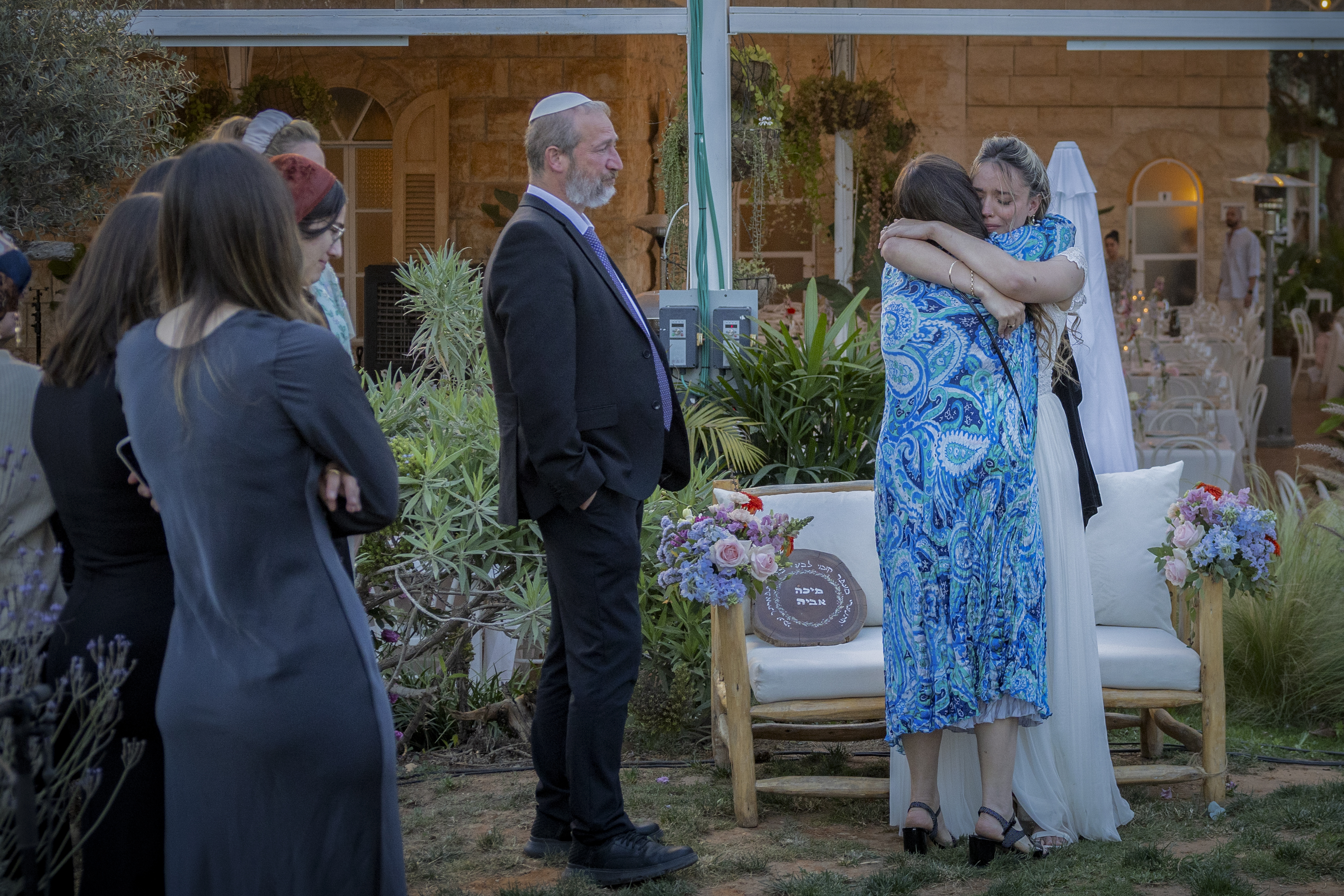 Avia with Yishai's parents, of blessed memory, before the chuppah